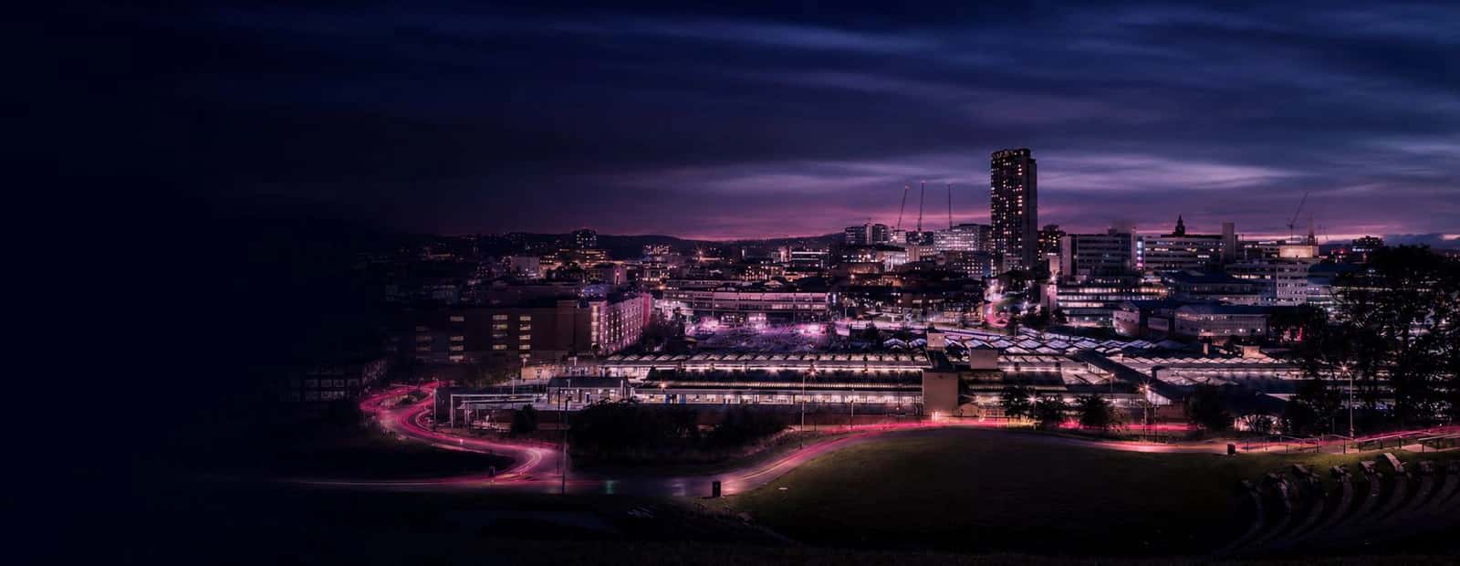 Sheffield city streets lit up at night — Empire outcall coverage area
